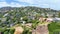 Aerial high up wide shot of Tiburon houses on hill