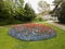 Aerial high view by drone on colorful flowerbed circle