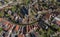 Aerial historic dutch village Maasland with central church and canal curving around