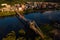 Aerial of Historic Wheeling Suspension Bridge + Downtown Buildings - Ohio River - Wheeling, West Virginia