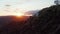 AERIAL: Hollywood Hills in Beautiful Sunset Golden Hour Light and view on Hollywood Sign on Mountain side in Los Angeles