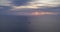 Aerial hyper lapse over the sea during sunset