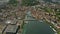 Aerial hyperlapse of famous Kapellbrucke or Chapel Bridge within the cityscape of Lucerne, Switzerland