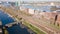 Aerial hyperlapse of an intersection on the Piet Hein kade in Amsterdam. tram, traffic, train and automobiles passing