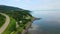 Aerial hyperlapse scene of St Joseph-de-la-Rive, Quebec, Canada by waterfront 4K