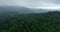 Aerial hyperlapse timelapse aerial view of clouds and mountains with green forest