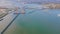 Aerial hyperlapse timelapse of a bridge and boats vessels sailing through a sluice passing under an open bridge