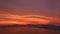 .aerial hyperlapse view amazing red sky in colorful sky above the island.