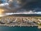 Aerial iconic sunset view over the port of Kalamata seaside city, Greece