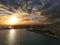 Aerial iconic sunset view over the port of Kalamata seaside city in Messenia, Greece