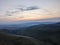 Aerial idyllic view from the mountains at sunset