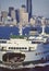 Aerial image of ferry boat and Seattle, Washington