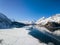 Aerial image of Insola, Maloja and Plaun da Lej on the frozen lake of Silsersee