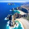 An aerial image of Lands End and the Arch at Cabo San Baja at the point where the Pacific Ocean and the Gulf of