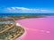 Aerial image of the Pink Lake and Gregory in Western Australia with Indian Ocean in background