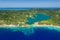 Aerial image of Roatan island, inland lake, and reef