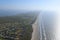 Aerial image of the Texas Gulf Coast, Galveston Island, United States of America. Haze due to warm weather conditions.