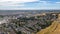 Aerial images over a neighborhood in Hayward, California with a blue sky and room for text