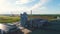 Aerial industrial premises among pictorial landscape under blue sky