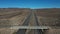 Aerial interstate freeway intersection California Nevada border area 4K 208