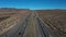 Aerial interstate freeway traffic Nevada California border area 4K
