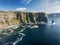 Aerial Ireland countryside tourist attraction in County Clare. The Cliffs of Moher and Burren Ireland.