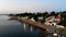 Aerial of Itaparica Island Shore, small houses and church.