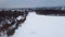 Aerial Kharkiv, frozen winter Lopan river with dam
