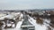 Aerial Kharkiv, speedup fly above frozen river dam
