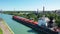 Aerial of a Lake Freighter leaving a lock in the Welland Canal, Canada 4K