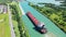 Aerial of a Lake Freighter sailing in the Welland Canal, Canada 4K