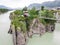 Aerial of a landmark in the Altai Territory Patmos Island with a monastery church and a suspended wooden bridge