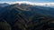 Aerial landscape of grand mountain valley with a river.