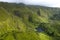 Aerial landscape image of sunset sunrise over PoÃ§o Ribeira do Ferreiro waterfalls and Lagoa dos Patos with its remarkable amazing