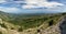 Aerial landscape with mediterranean sea, forest, hills, blue sky and cloud patches. French riviera in July.