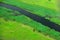 Aerial landscape in Okavango delta, Botswana. Lakes and rivers, view from airplane. Green vegetation in South Africa. Trees with w