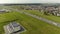 Aerial landscape of the outskirts of the city with a ring road in the summer