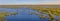 Aerial landscape panorama view on Desna river with flooded meadows and fields. View from high bank on annual spring