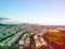 Aerial landscape photo of Recreio dos Bandeirantes during sunset, with all the residential buildings forming a grid