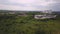 Aerial landscape with pink lake in industrial zone, toxic chemicals