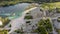 Aerial landscape Sand Hills of Quarry With a Pond and Abandoned Prison in Rummu Estonia Europe.