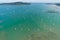 Aerial landscape Seascape Chalong pier with sailboats Yacht boats and ravel boats in the sea Amazing view travel image by Drone