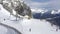 Aerial landscape snowy mountain peaks on ski resort. Skiing and snowboarding