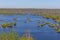 Aerial landscape view on Desna river with flooded meadows and fields. View from high bank on annual spring overflow