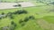 Aerial Landscape View moving forward and over a vast Scottish grassland