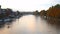 Aerial Landscape View over a River with a person paddling a kayak on it