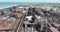 Aerial of large metal factory, blast furnaces.