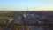 Aerial, large mining complex with two large active smoke stacks. Mt Isa, Queensland, Australia 09 26 2018