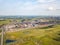 Aerial of a large plant with mines for the extraction of coal. Mounds of black coal near production and industry