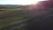 Aerial Lavender fields. Endless rows of blooming lavender fields on summer sunset time. Lavender Oil Production. Field